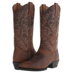 Angled view of the toe box and vamp stitching on a brown leather western boot