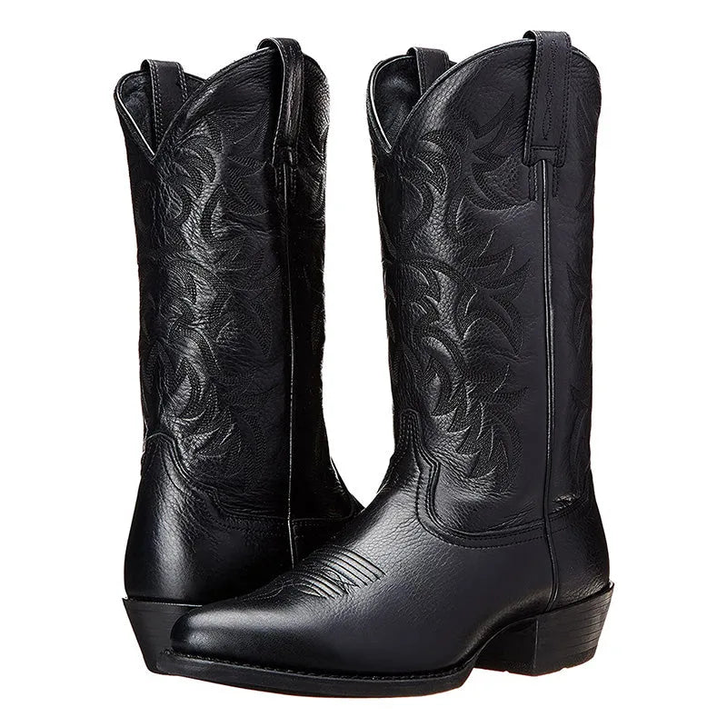 Pair of black leather cowboy boots shown straight on, displaying pointed toe and stacked block heel