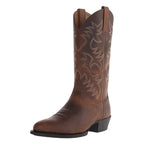Three-quarter angled view of a brown leather cowboy boot highlighting the embroidered shaft pattern