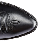Close-up side view of the black leather boot showing grain texture and tonal western embroidery