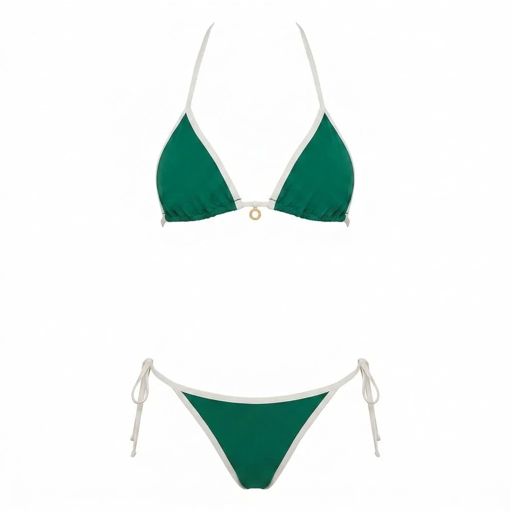Front view of model wearing navy triangle bikini top with thin adjustable straps and cream trim