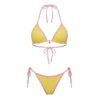 Front view of brown triangle bikini on model showing the fit across the bust