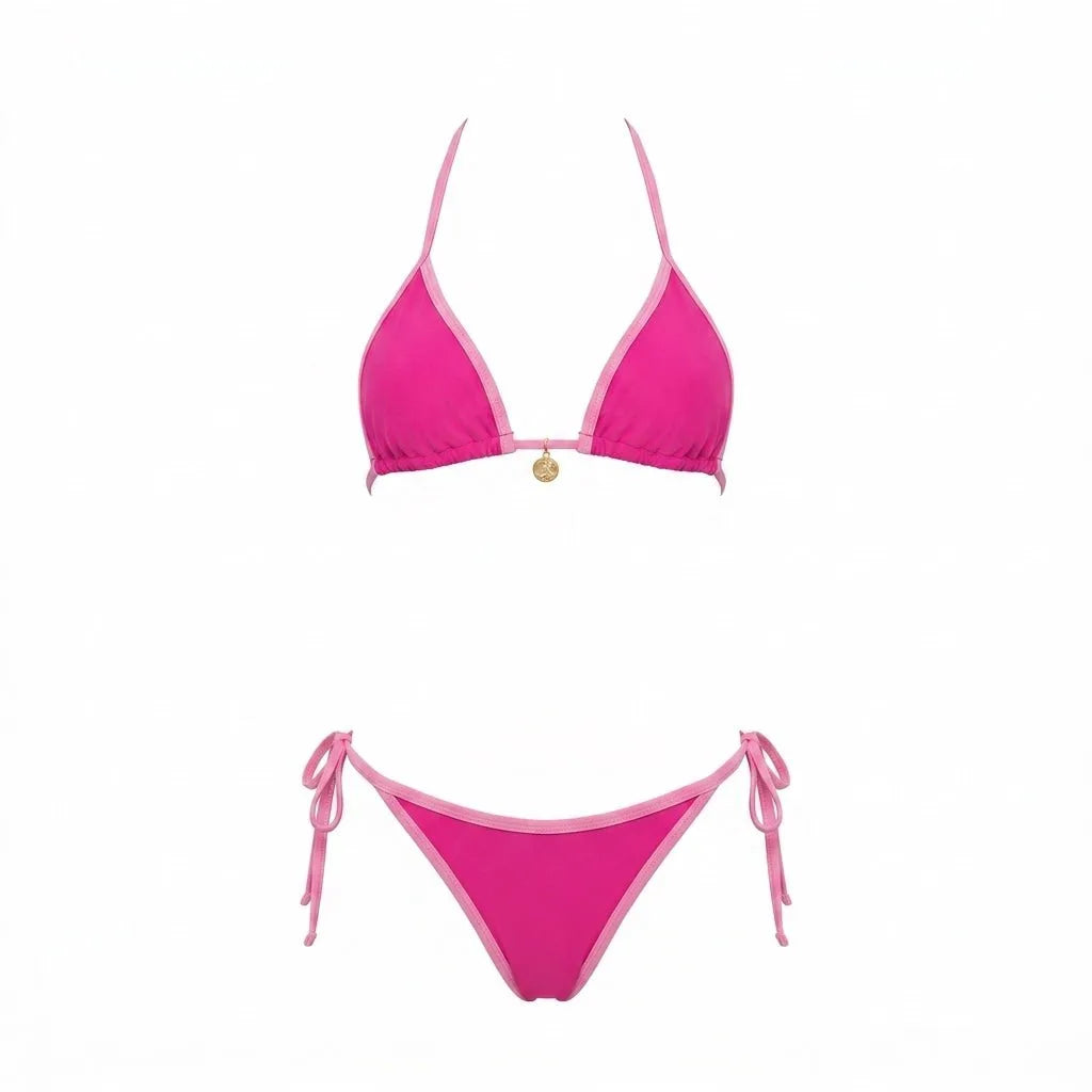 Model wearing navy bikini bottoms showing the adjustable tie-side bow detail