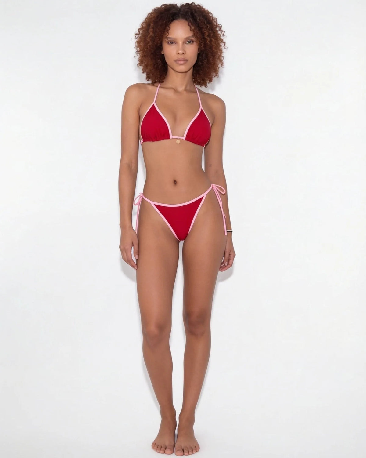 Close-up of the triangle top shape on the navy bikini showing fabric texture