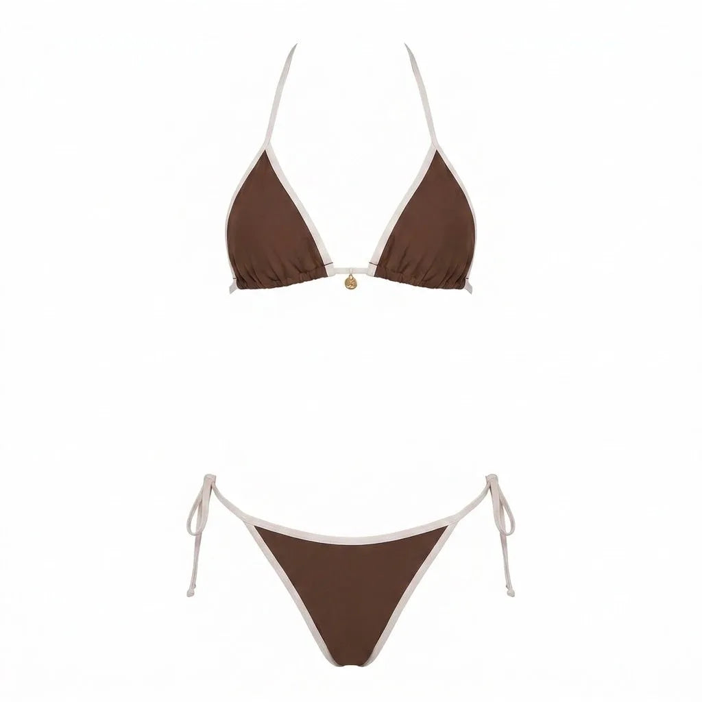 Flat lay of brown triangle bikini top and tie-side bottoms with cream contrast binding