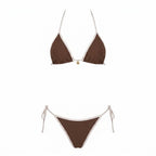 Flat lay of brown triangle bikini top and tie-side bottoms with cream contrast binding