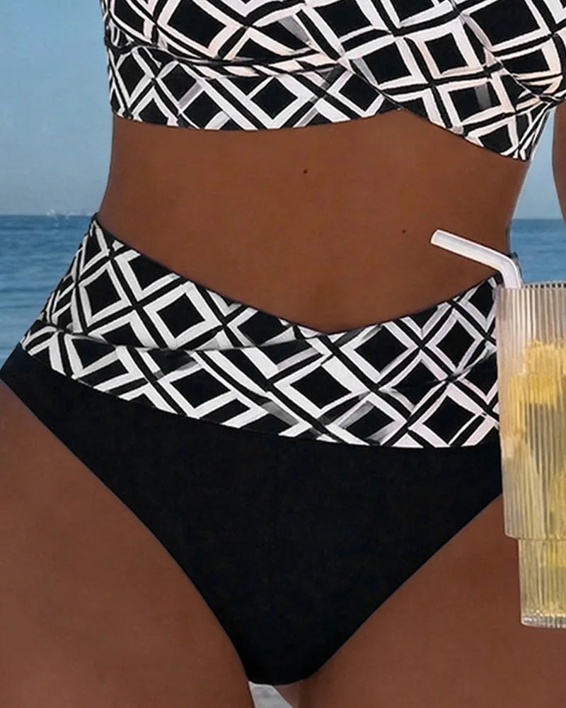 Close-up of the high-waisted black and white patterned bottom with solid black panel underneath