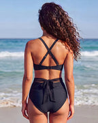 Detail of the black ruched bottom with honeycomb mesh side panel and tie closure