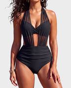 Front close-up of the black bikini bralette top with mesh straps crossing over the chest