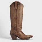 Back angled view of a chocolate brown leather cowboy boot showing the heel counter and pull tab