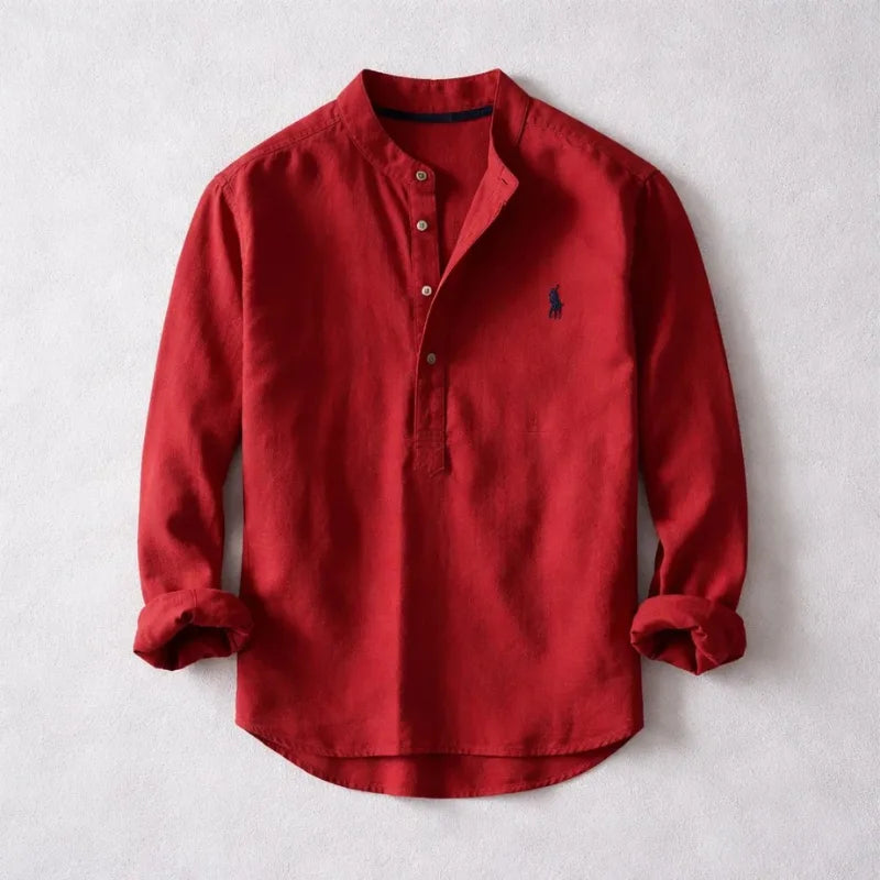 Red henley shirt with band collar and short button front, long sleeves folded at the cuff, laid flat
