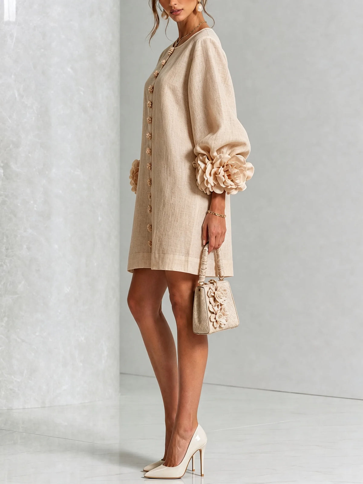 Side profile of the olive green dress showing the sleeve silhouette and dress length above the knee