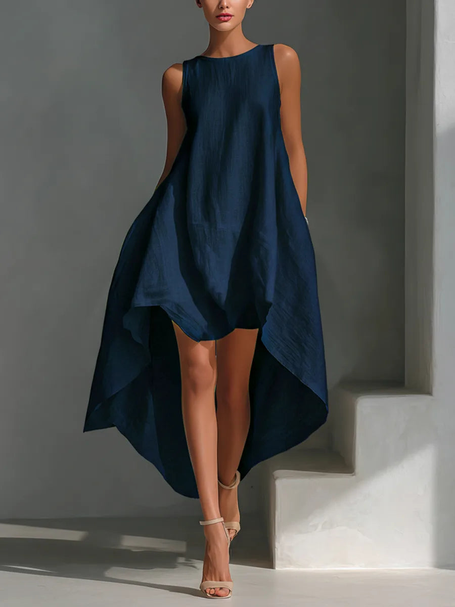 Warm yellow version of the sleeveless linen midi dress with round neck and asymmetric hem