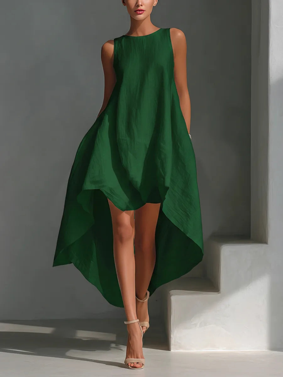 Navy blue colourway of the linen midi dress showing its loose, swingy A-line shape