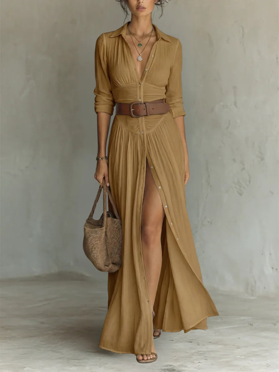 Camel brown long-sleeve maxi dress with notched collar, button front and cinched waist, paired with sandals