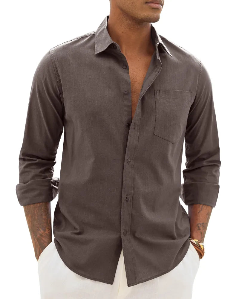 Close crop of a charcoal grey linen-cotton shirt with spread collar, unbuttoned at the top