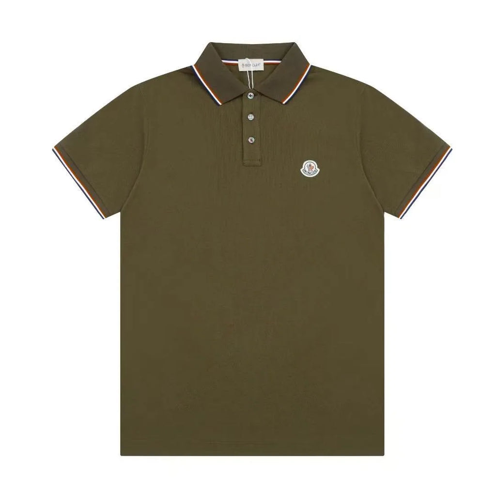 Army green polo shirt with tipped collar and cuffs in contrast stripes, logo patch on chest, laid flat
