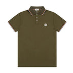 Army green polo shirt with tipped collar and cuffs in contrast stripes, logo patch on chest, laid flat
