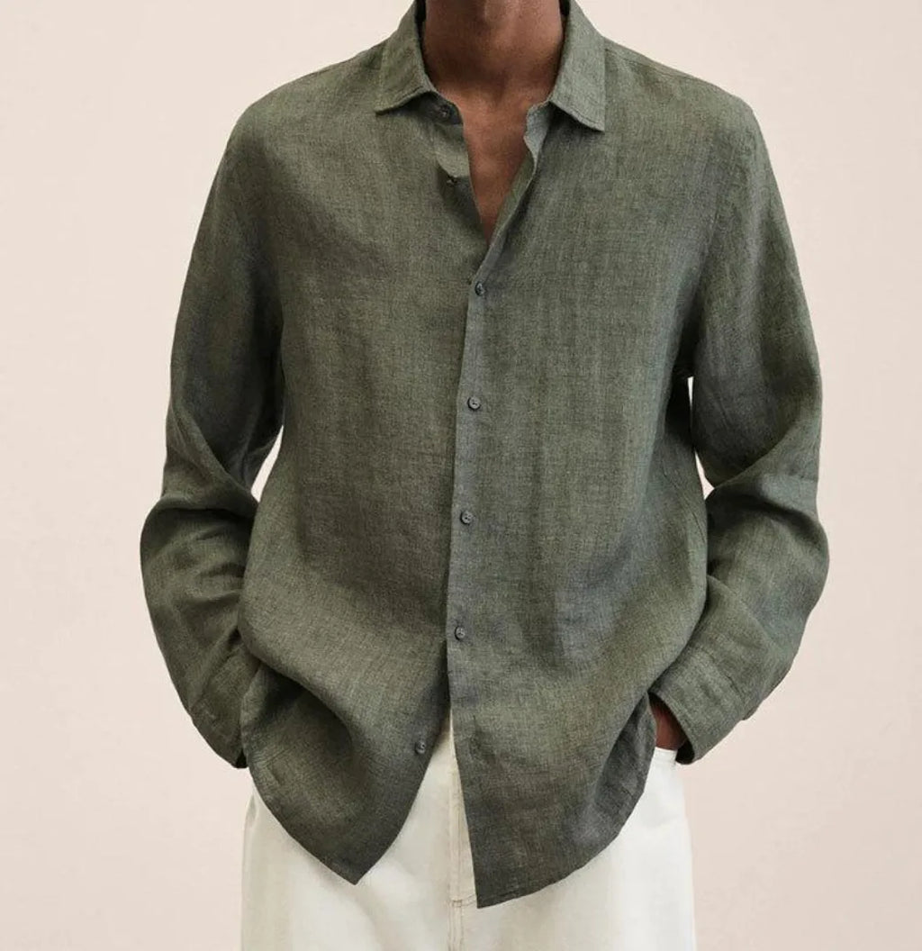 Detail shot of the linen shirt fabric weave and button stitching against a neutral background