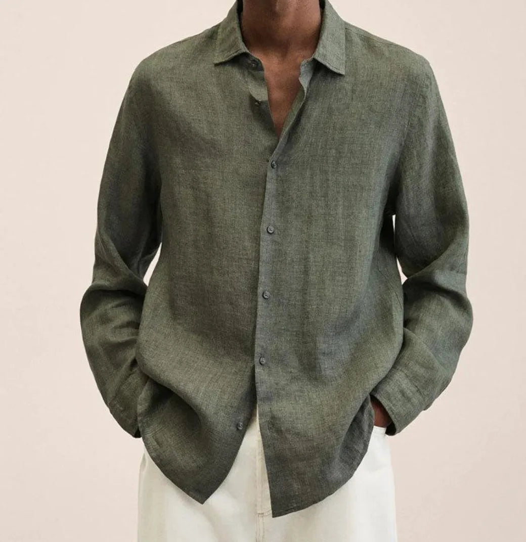 Detail shot of the linen shirt fabric weave and button stitching against a neutral background