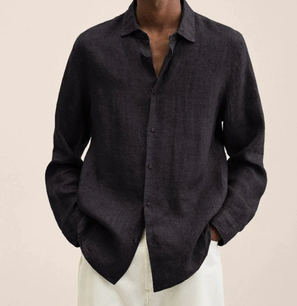 Front view of a charcoal grey linen shirt with open collar, showing the subtle textured weave up close
