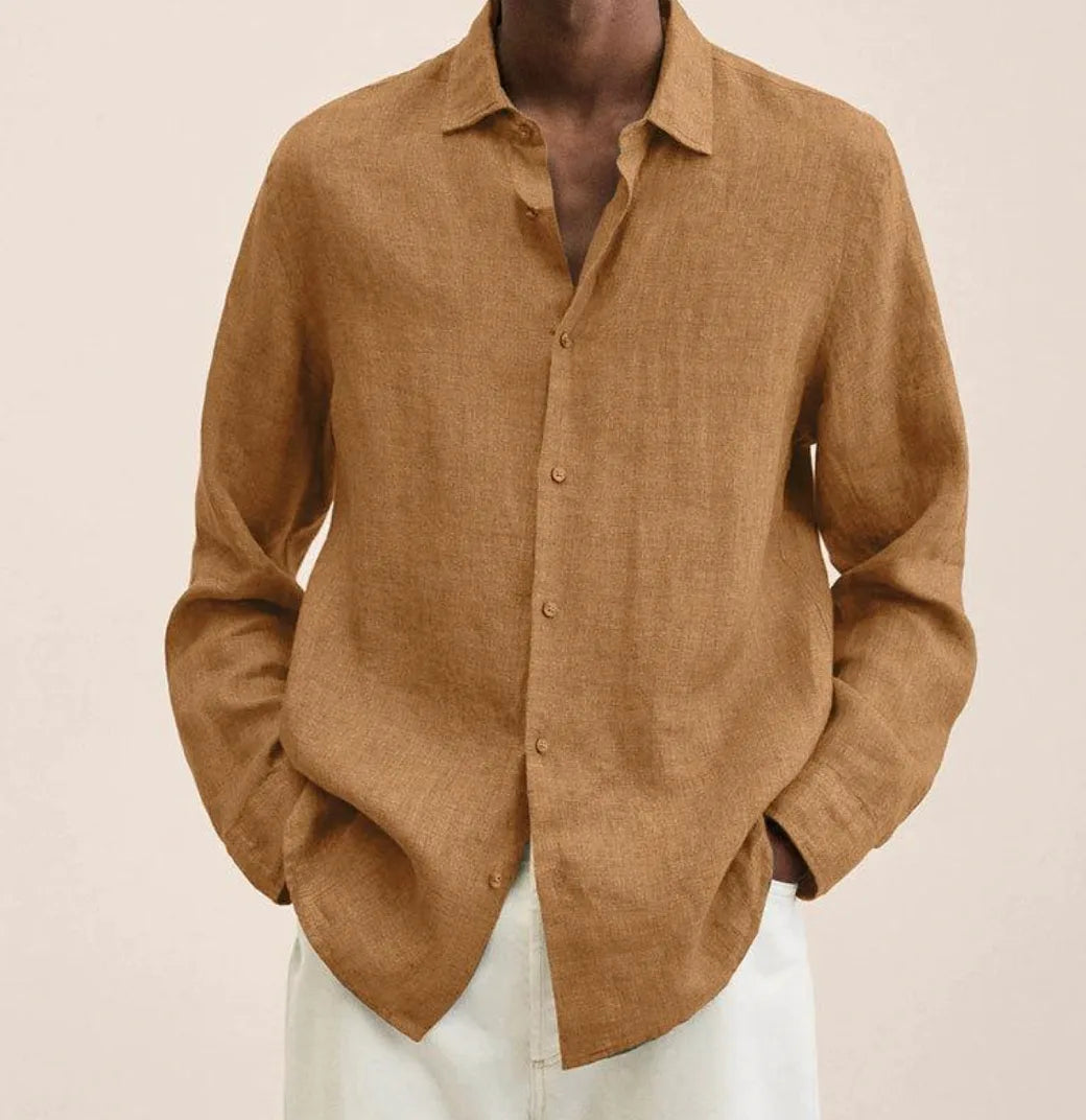 Close-up of a tan brown linen shirt with classic point collar and matching button detailing