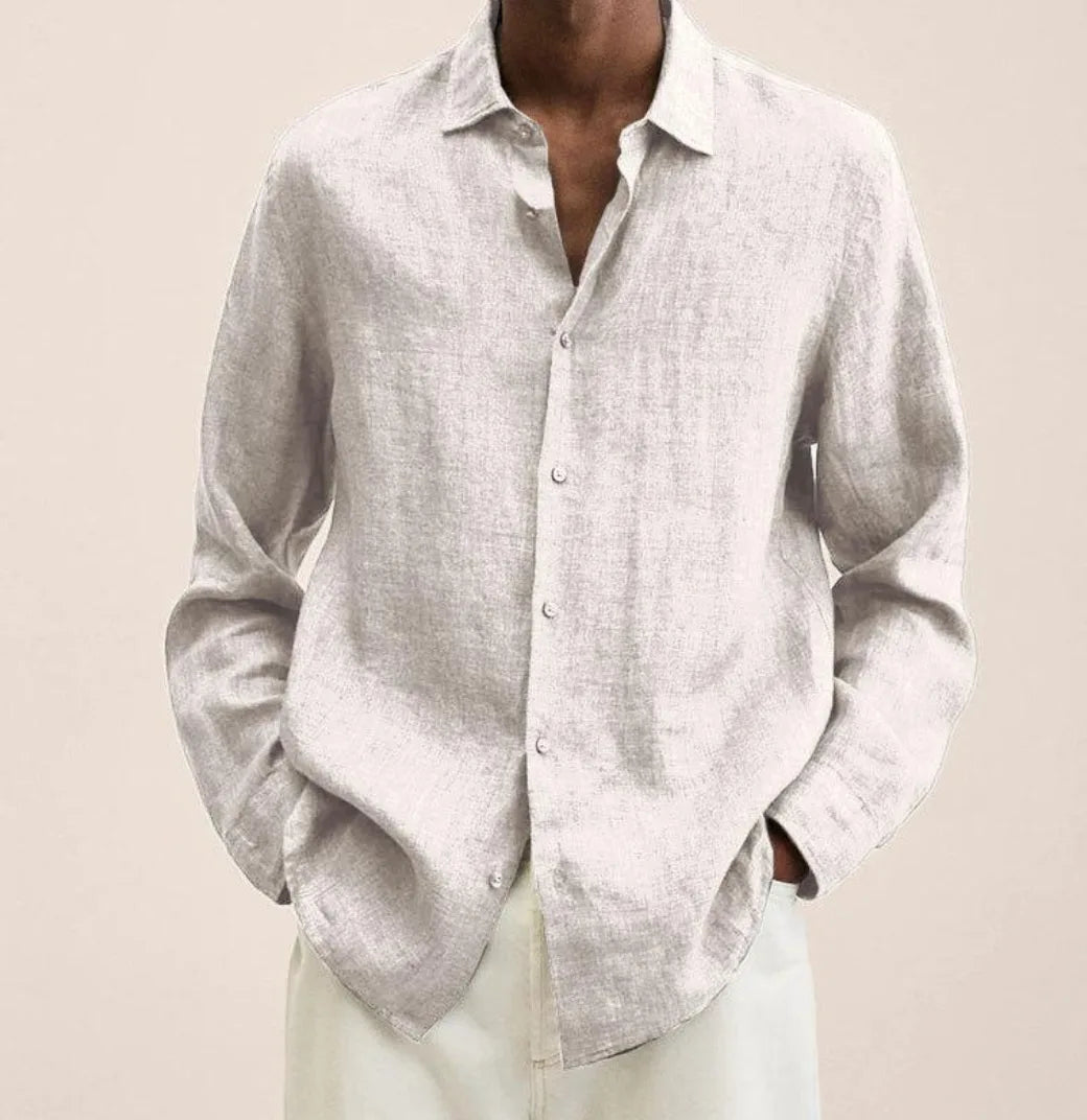 Front view of a light beige linen shirt showing the soft natural fabric texture and relaxed fit