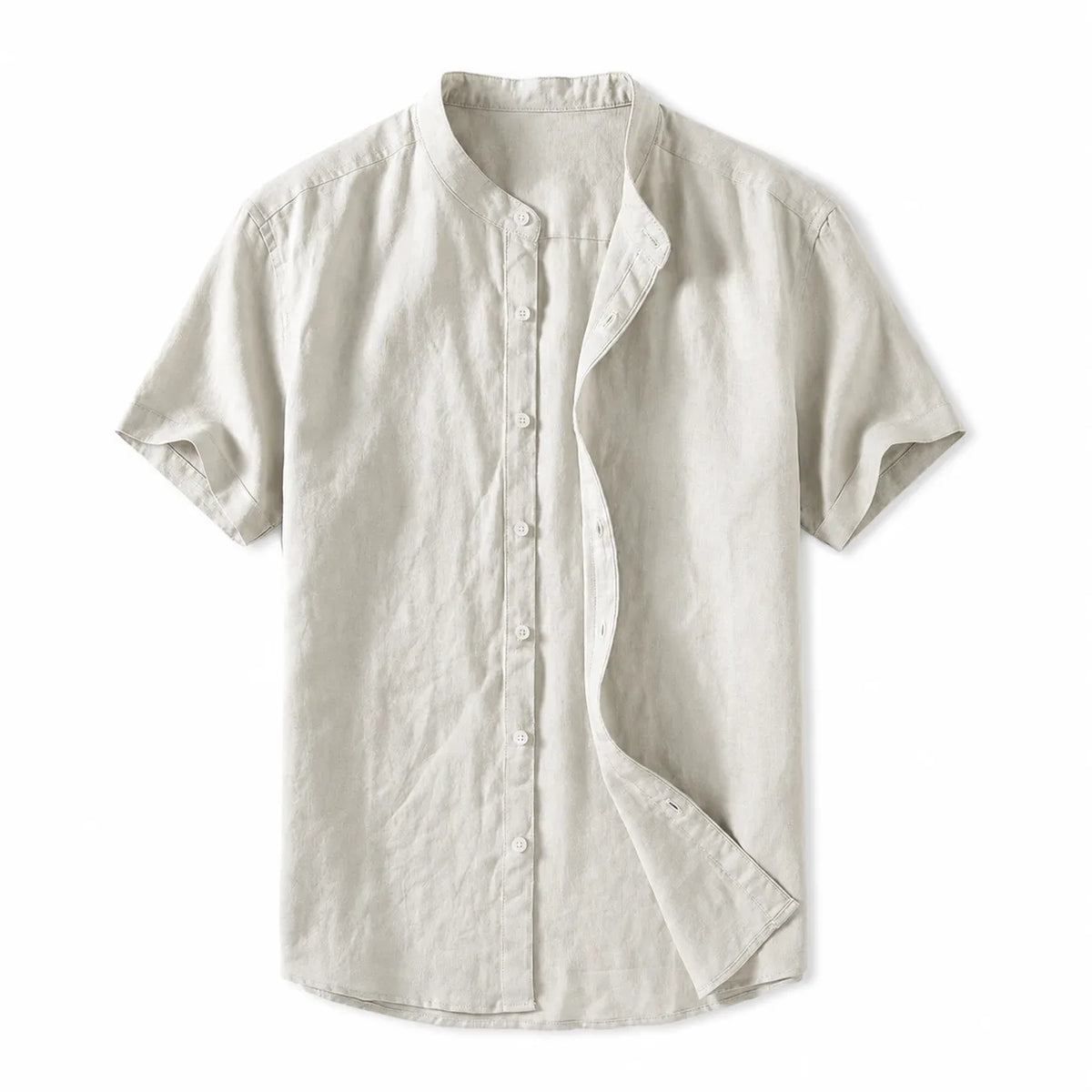 Flat lay of an ivory linen short sleeve shirt with a stand collar and full button placket
