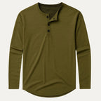 Flat lay of olive green long sleeve henley shirt with four-button placket and curved hem