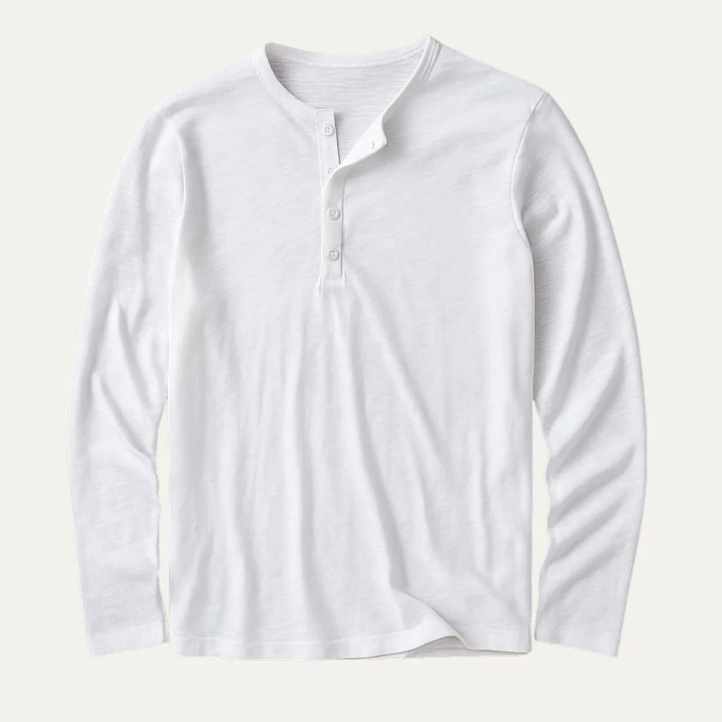 Flat lay of white long sleeve henley shirt with matching button placket and crew-style collar