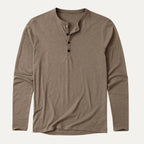 Flat lay of khaki brown long sleeve henley shirt with four-button front closure