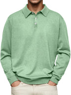 Full front view of long-sleeve knit polo top highlighting relaxed fit and banded waist hem