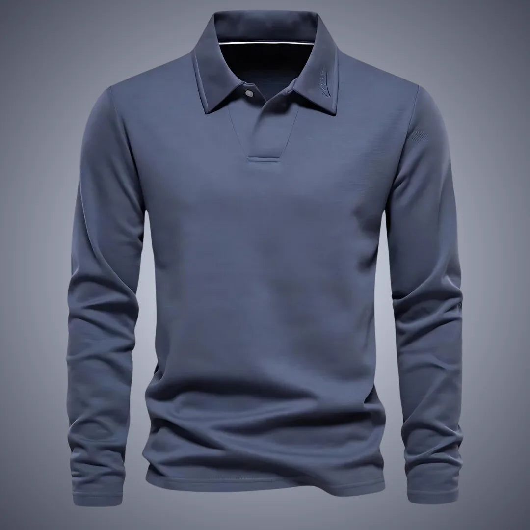 Slate blue long-sleeve polo shirt, front view, showing ribbed collar, button placket and embroidered logo detail