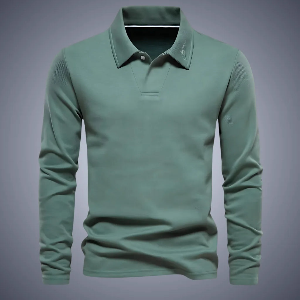 Sage green long-sleeve polo shirt with classic collar and two-button placket, shown against a grey backdrop