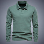 Sage green long-sleeve polo shirt with classic collar and two-button placket, shown against a grey backdrop