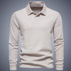 Beige long-sleeve polo shirt, front view, highlighting the smooth pique fabric and tonal stitching