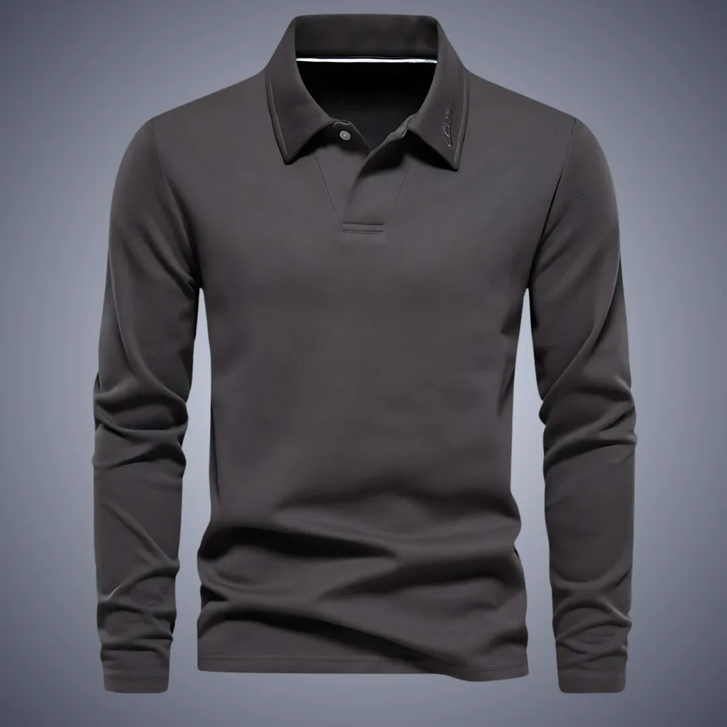 Dark grey long-sleeve polo shirt, front view, showing the structured collar and subtle chest embroidery
