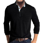 Front view of a man wearing a black long-sleeve polo shirt with white and black contrast collar detail and chest pocket