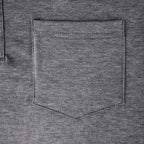 Detail shot of the button fastening and ribbed collar on the burgundy polo shirt