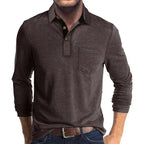 Man wearing a dark brown long-sleeve polo shirt with contrast collar trim and wooden-style buttons
