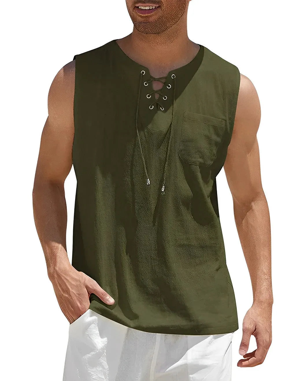 Front view of man wearing an army green sleeveless top with lace-up V-neck and chest pocket