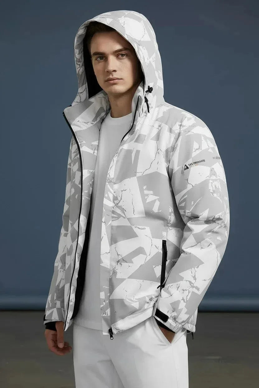 Close-up front angle of the hooded jacket showing the drawcord hood, zip pockets and geometric camo pattern