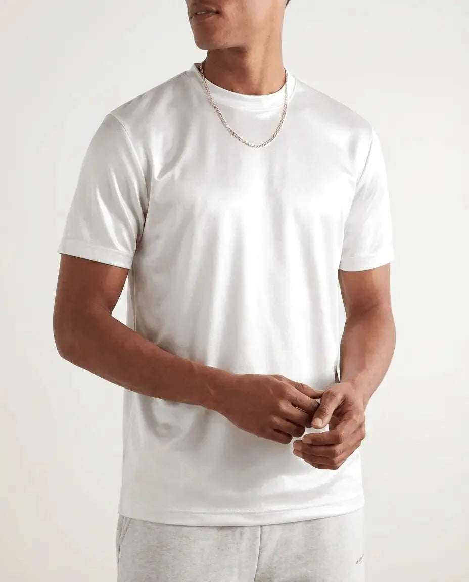 Front view of man in white mercerised cotton t-shirt with crew neck and silver chain necklace