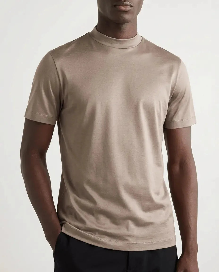 Front view of model in a taupe mercerised cotton t-shirt with fitted crew neckline