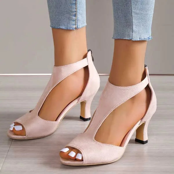 Front angled view of pink suede peep-toe sandal with T-bar strap and back zip closure
