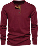 Dark red ribbed long-sleeve henley tee with tan button placket and crew neckline, front view