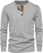 Light grey ribbed henley tee with tan button trim at the neckline, long sleeves shown front on