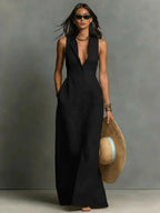 Front view of the black sleeveless collared maxi dress with plunging button-front neckline