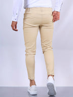 Full front view of slim tapered chino pants showing clean leg line from waist to ankle