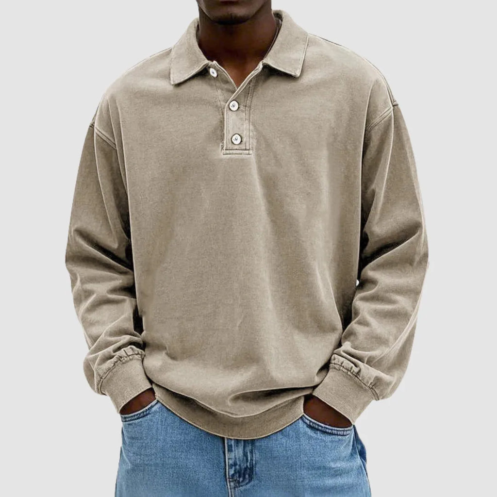 Khaki long-sleeve polo top with relaxed oversized fit and visible stitched seam detail across the chest